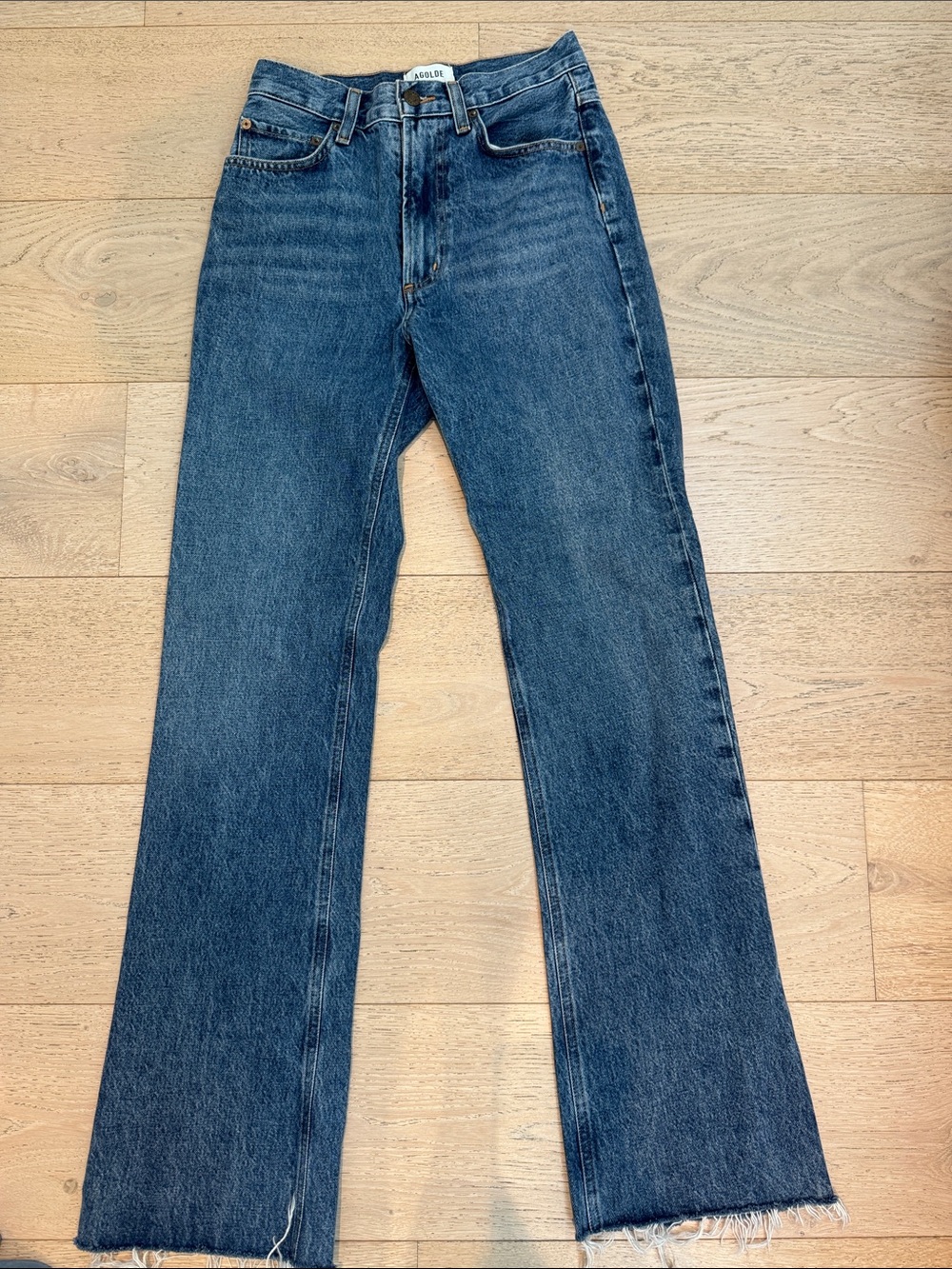 Agolde Dark Blue Flare Jeans with Raw Hem